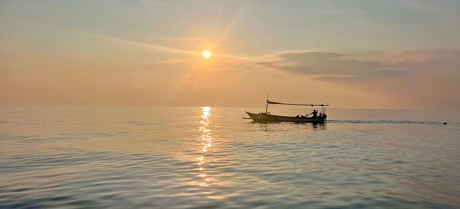 Blue Dolph Pemuteran team with local dolphin watching and snorkeling guides in North Bali